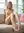 Pink hair nude spread on couch