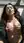 Asian trainer topless on office floor