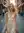 Blonde in satin jumpsuit street pose