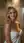 Young blonde in steamy shower