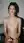 Young adult nude at office desk