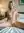 Nude blonde spreads on bed