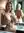 Blonde squeezes breasts in bathroom