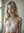 Blonde in sheer white lace bra