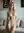 Athletic nude body in living room