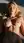 Curvy blonde topless in sunlight