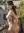 Asian nude on sunny balcony