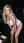 Blonde bends over in club bodysuit