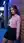 Slim brunette curves in neon alley