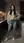 Slim asian in kitchen jeans