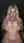 Platinum blonde squeezes oily tits