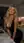 Curvy blonde low angle kitchen