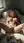 Green-eyed blonde touching herself