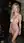 Curvy nude in wine cellar