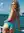 Blonde in polka dot bikini on yacht