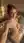 Redhead cleavage selfie in beige dress