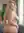 Long wavy blonde nude over shoulder glance