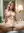 Young adult spreads in bathroom