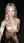 Young adult nude garden selfie