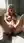 Blonde fingers her wet pussy
