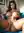 Nude on teal couch legs spread