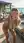 Young adult blonde beachside bend