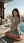 Curvy brunette on rooftop terrace