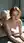 Nude redhead on floor mattress