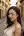 Asian brunette in alley close-up