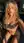 Nude blonde kneeling dressing room selfie