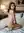 Young adult lace bodysuit bedroom
