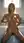 Nude blonde laundry room pose