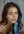 Brunette licks blue dildo close up