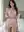 Zara in satin camisole with fur trim
