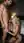Young adult blonde on knees