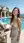 Poolside sundress cleavage laugh