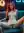 Redhead nude on couch with neon lights