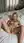 Young adult blonde fingers herself in bed