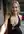 Plunging black dress cleavage selfie