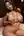 Young adult ebony squeezes breasts