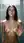 Nude in sunlit shower glass