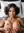 Topless brunette squeezing big tits in POV bedroom