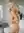 Over-shoulder nude living room glance