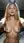 Curvy blonde topless selfie in bed