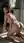 Redhead nude on kitchen floor