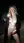 Blonde wavy hair night sidewalk flash