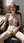 Redhead glasses nude in office chair