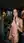 Wavy brunette licks cock in penthouse