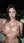 Brunette holds big breasts on terrace