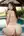 Brunette Asian looks back poolside